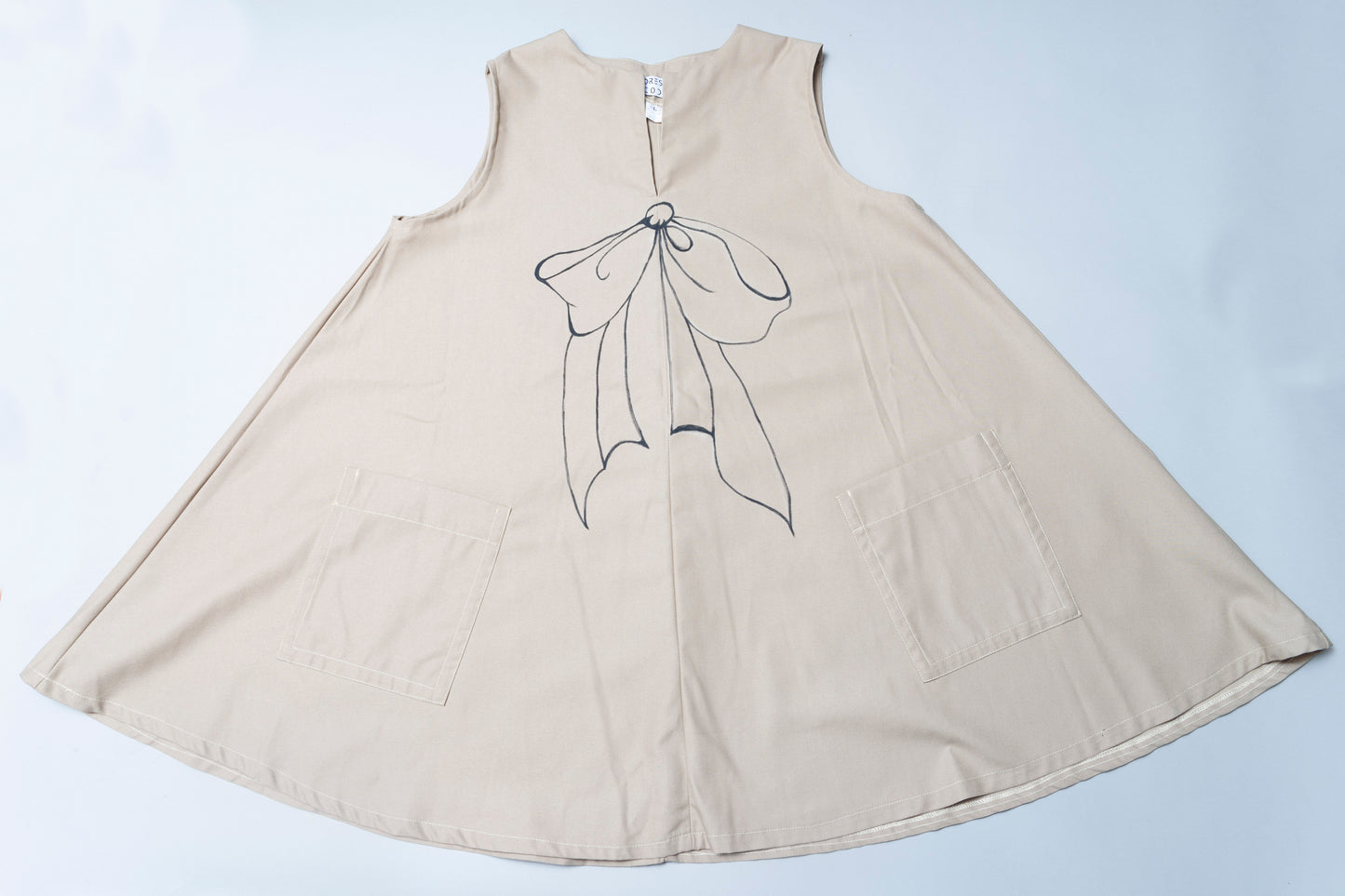 Sustainably made in Philadelphia, PA from second hand fabric.