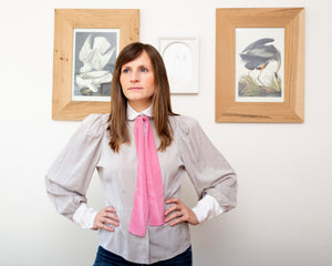 Vintage clothing is sustainable fashion. Like this 1980s silky peasant blouse, with attached pink tie